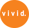 An orange & round logo of the Vivid. Online, presented with no background.